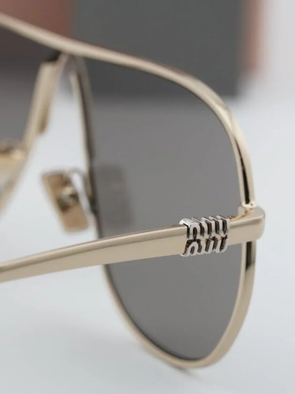 Miu Miu MUA56S ZVN80Q Geometric Sunglasses – Gold/Dark Grey